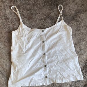 Baby blue tank top ( looks white but it’s blue)